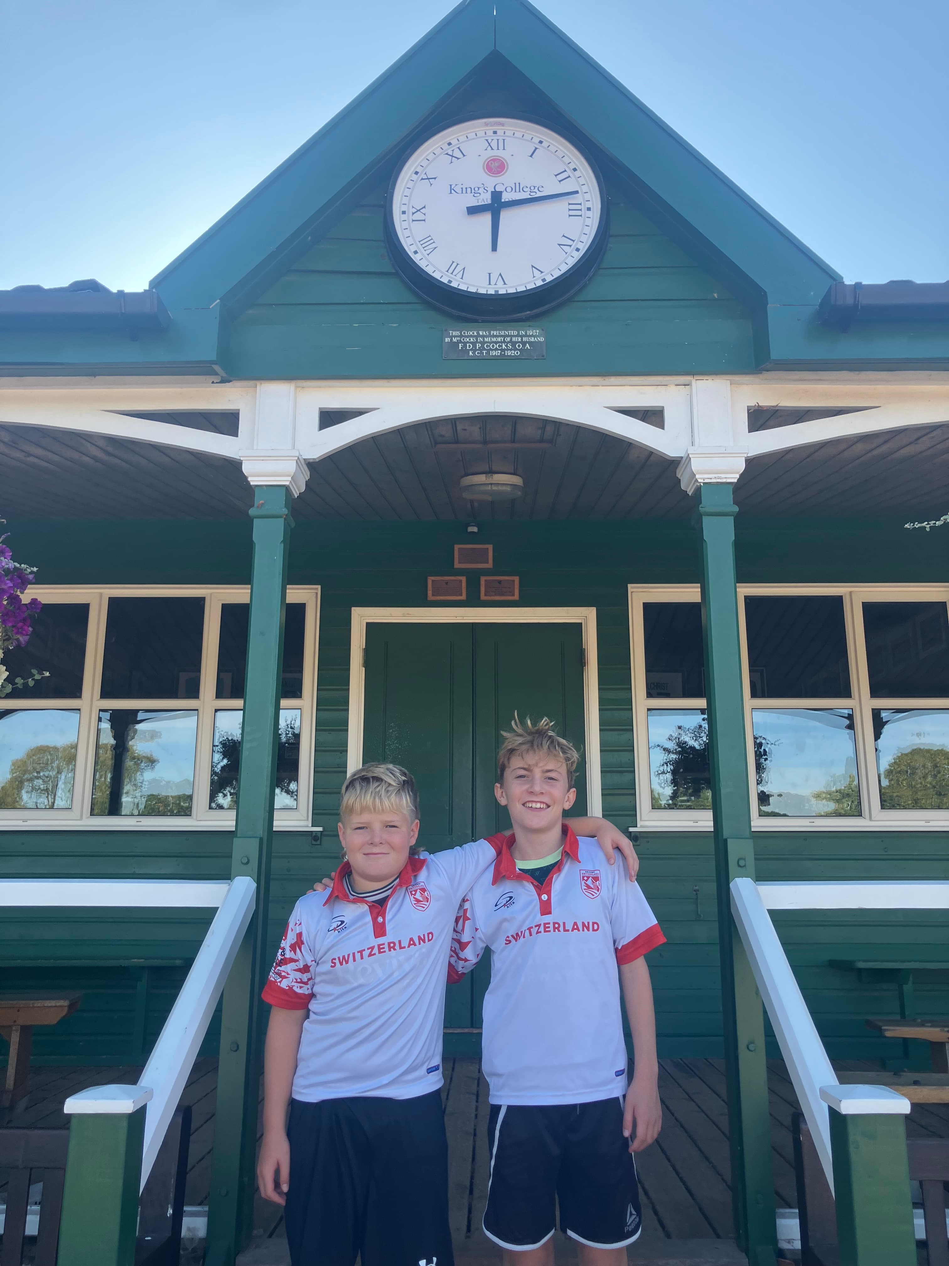 The boys proudly wearing their Swiss colours